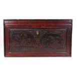 An early 20th century Chinese trunk, the removable door with lacquered panel depicting figures in