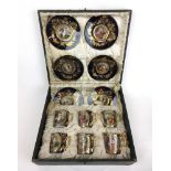 A six place Royal Vienna coffee cup set decorated with classical scenes and gilt detailing. In