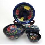 A selection of Moorcroft pottery to include two bowls and a trinket box A/FHeavy damage/restoration