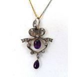 An early 20th century white metal, amethyst and diamond pendant in the Belle Époque manner. The