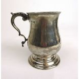 A Victorian silver baluster tankard. Hallmarked for London 1898, makers mark for Charles Stuart