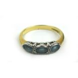 An 18ct gold, aquamarine and diamond dress ring. Approx. weight 3.1g. Size Q