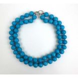 A double strand turquoise bead necklace, l. 45 cm