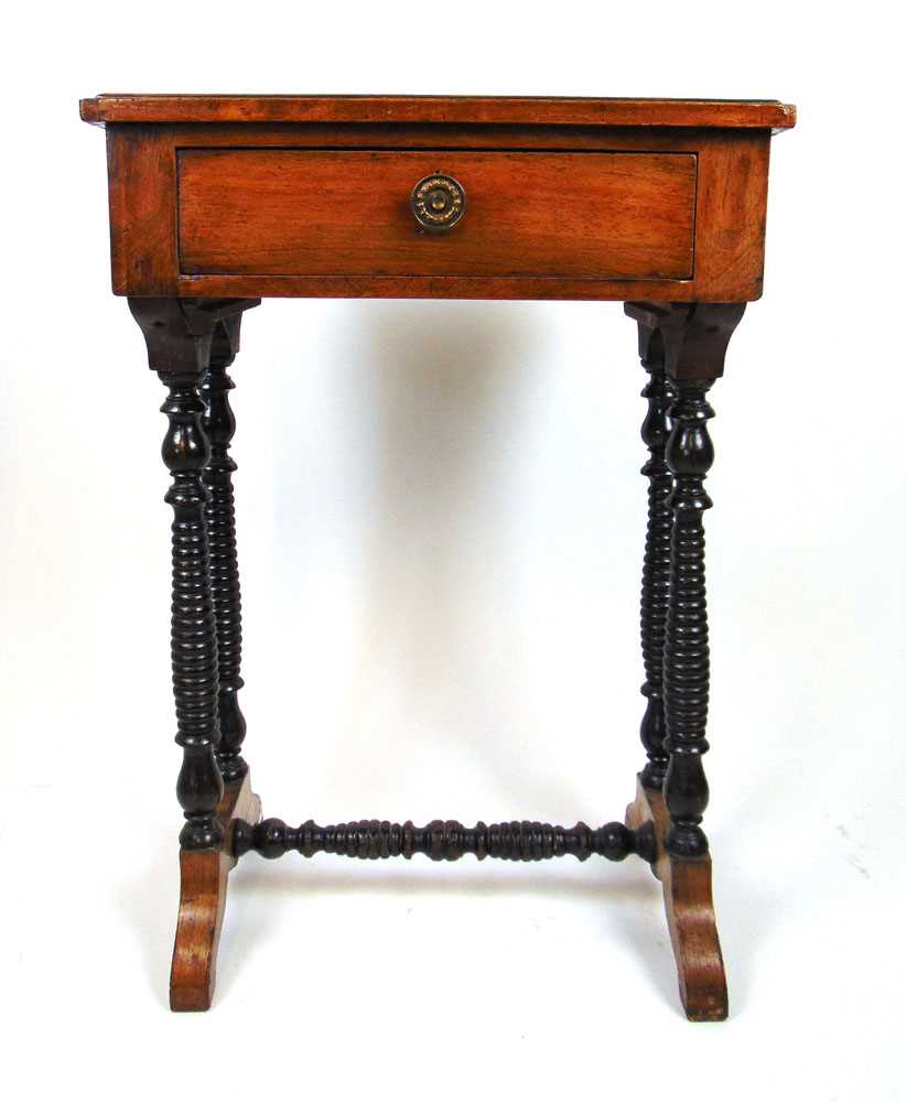 An early 19th century rosewood work table, the top over a single drawer on bobbin turned legs and