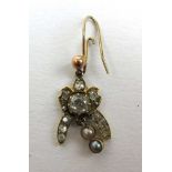 A single late Victorian/Edwardian yellow metal, old cut diamond and seed pearl earring. Central