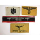 A Deutscher Volksstrum Wehrmacht armband together with a Luftwaffe armband and two others