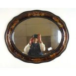 An early 20th century chinoiserie oval bevel glass mirror, h. 55 cm, w. 65 cmCondition