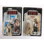 A Star Wars Return of the Jedi figure 'Logray (Ewok Medicine Man)' together with 'Prune Face' and