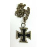 A WWII Third Reich iron cross (second class) on later chain.
