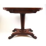 A William IV mahogany card table, the fold over top supported on a swivel action over the tapering