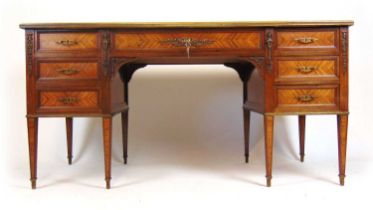 A 19th century French rosewood, kingwood, boxwood strung and brass mounted freestanding desk (bureau
