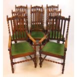 A set of eight (6+2) early 20th century oak dining chairs with green upholstered pad seats, h. 113