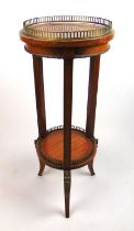 An early 20th century satinwood, strung, marquetry and brass mounted jardinière stand, the galleried