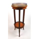 An early 20th century satinwood, strung, marquetry and brass mounted jardinière stand, the galleried