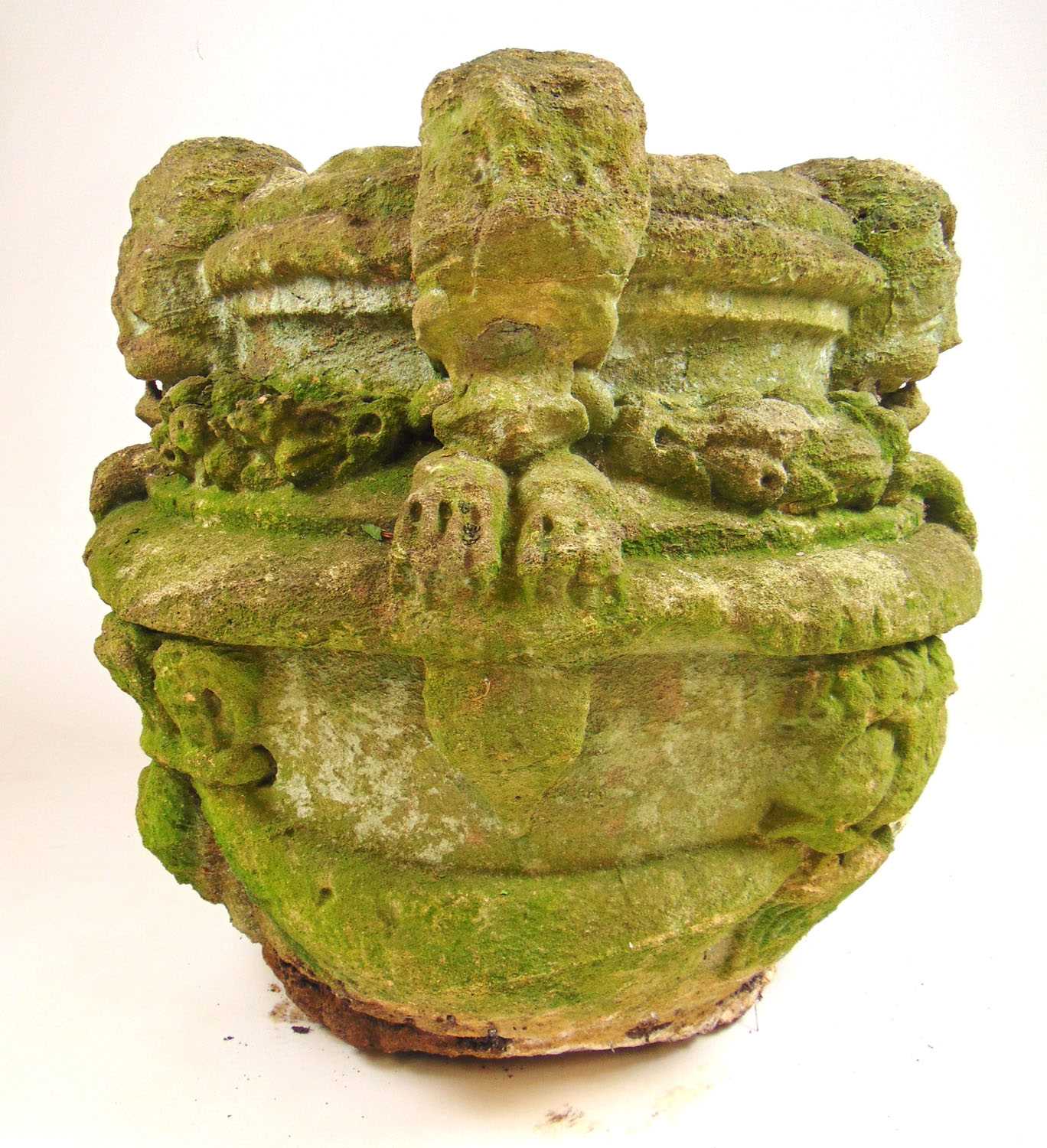A possible medieval carved stone font, the rim with four masks holding floral swags in their - Bild 2 aus 7