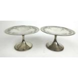A pair of white metal engraved and pierced comports marked 'Sterling'. Approx weight 349g, h. 9 cm