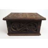 A 19th century carved oak box with paper label stating it was carved in 1888 by a child aged 8 1/