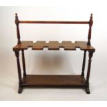 An early 19th century oak boot rack, with turned end supports, h. 87 cm, w. 82 cm, d. 35 cmSplit