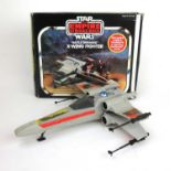 A boxed Palitoy Star Wars The Empire Strikes Back ''Battle Damaged'' X-Wing Fighter