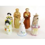 A collection of Royal Worcester candle snuffers to include Mandarin, monks, Japanese Girl, bell