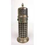 A late Victorian silver sugar caster. The body having pierced reticulated decoration, the lid with a