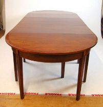 An early 19th century mahogany, marquetry and rosewood banded dining table comprising of two D-ends,