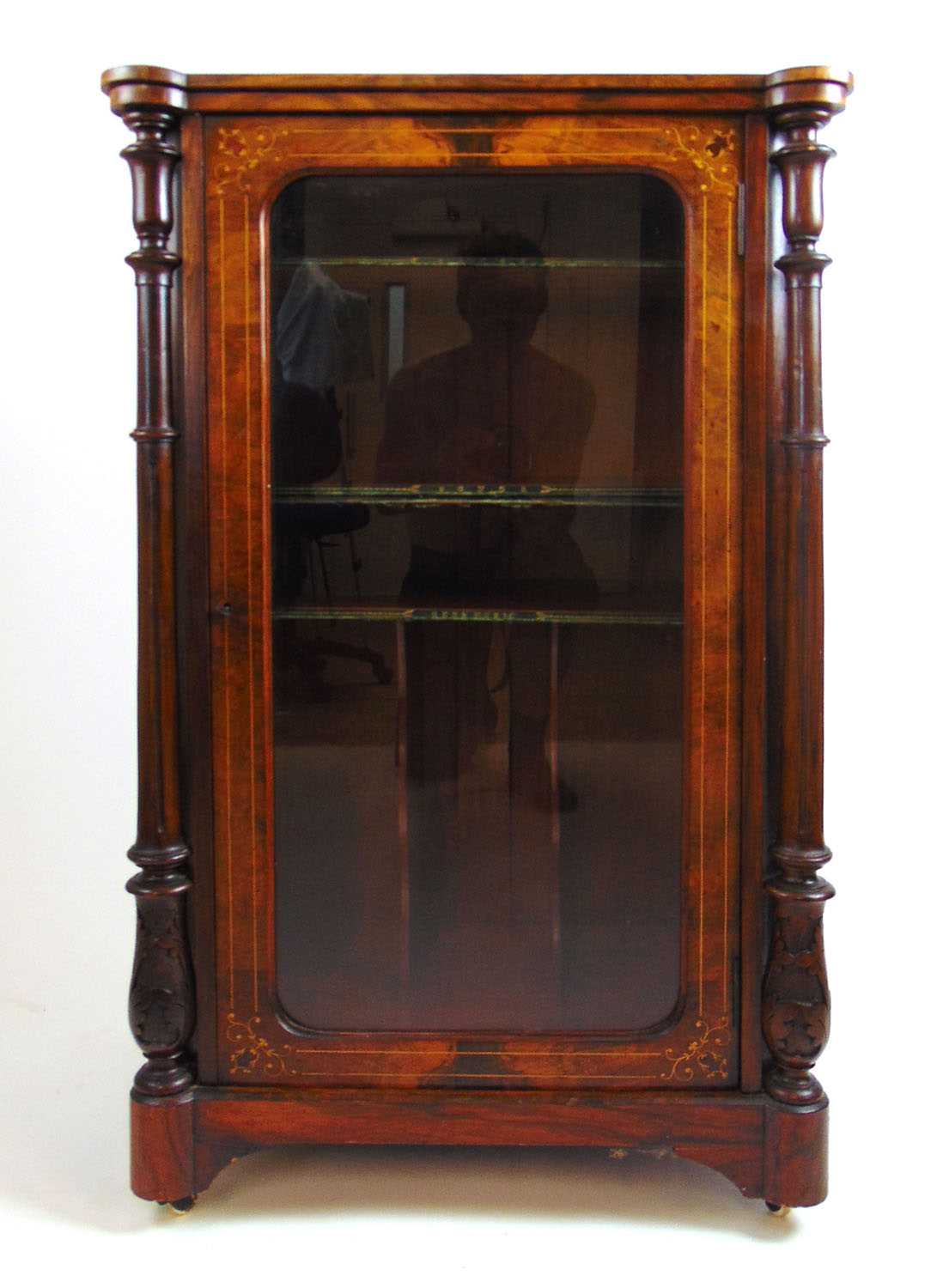 An Edwardian burr walnut, boxwood strung and marquetry music cabinet, the single glazed door