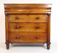 A 19th century mahogany chest of drawers, the top over a concave fronted drawer over three long