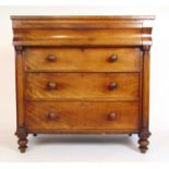 A 19th century mahogany chest of drawers, the top over a concave fronted drawer over three long