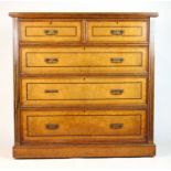 A late 19th century pollard oak, boxwood and ebony strung chest of two short over three graduated