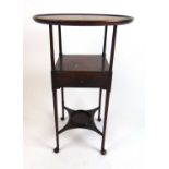 An 18th century mahogany wash stand, the dish top over under tier with drawer on turned legs with