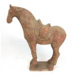 A Chinese Terracotta model of a horse, probably Tang Dynasty, h. 33 cmWith purchase receipt. No