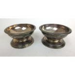 A pair of George III silver open salts. Hallmarked for London 1810, makers mark rubbed. Approx