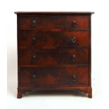 An 18th century mahogany apprentice chest of four long drawers on later bracket feet, h. 31 cm, w.