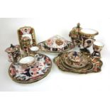 A collection of Royal Crown Derby Imari tableware and ornaments to include pots, plates, cups, cover