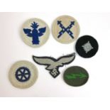 A collection of Third Reich era navy and air force cloth badges