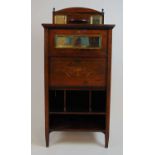 An Edwardian rosewood, boxwood strung and marquetry music cabinet, the back with beveled mirrors