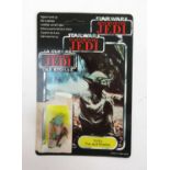 A Star Wars Return of the Jedi figure 'Yoda, The Jedi Master' with card back