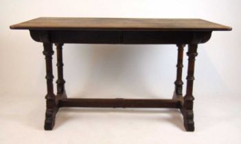 A late 19th century oak arts and Crafts library table by Seddon & Co. 58 South Moulton Street, the