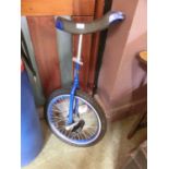 A blue framed unicycle