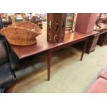 A mid-20th century design teak extending dining tableThe table is 91cm wide, closed 135cm and