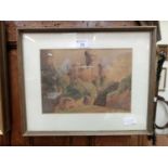 A framed and glazed watercolour of a castle dated 1864