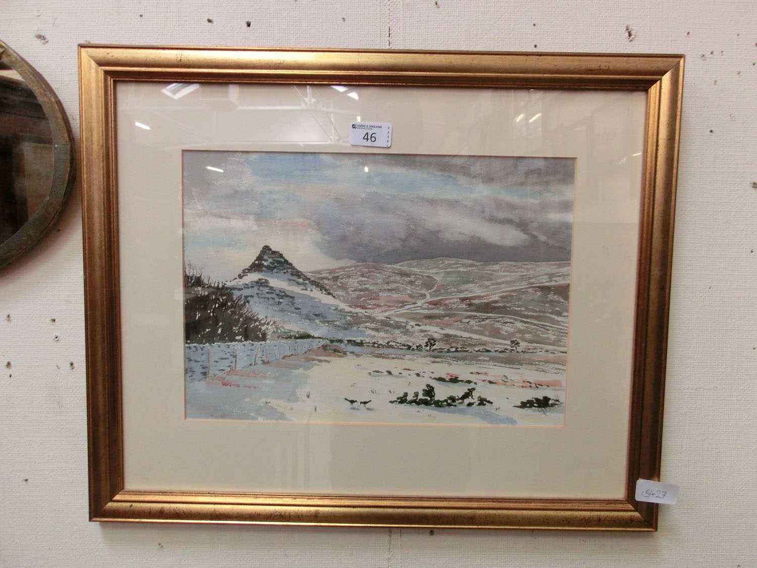 A framed and glazed watercolour of snowy mountain scene signed bottom right