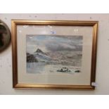 A framed and glazed watercolour of snowy mountain scene signed bottom right