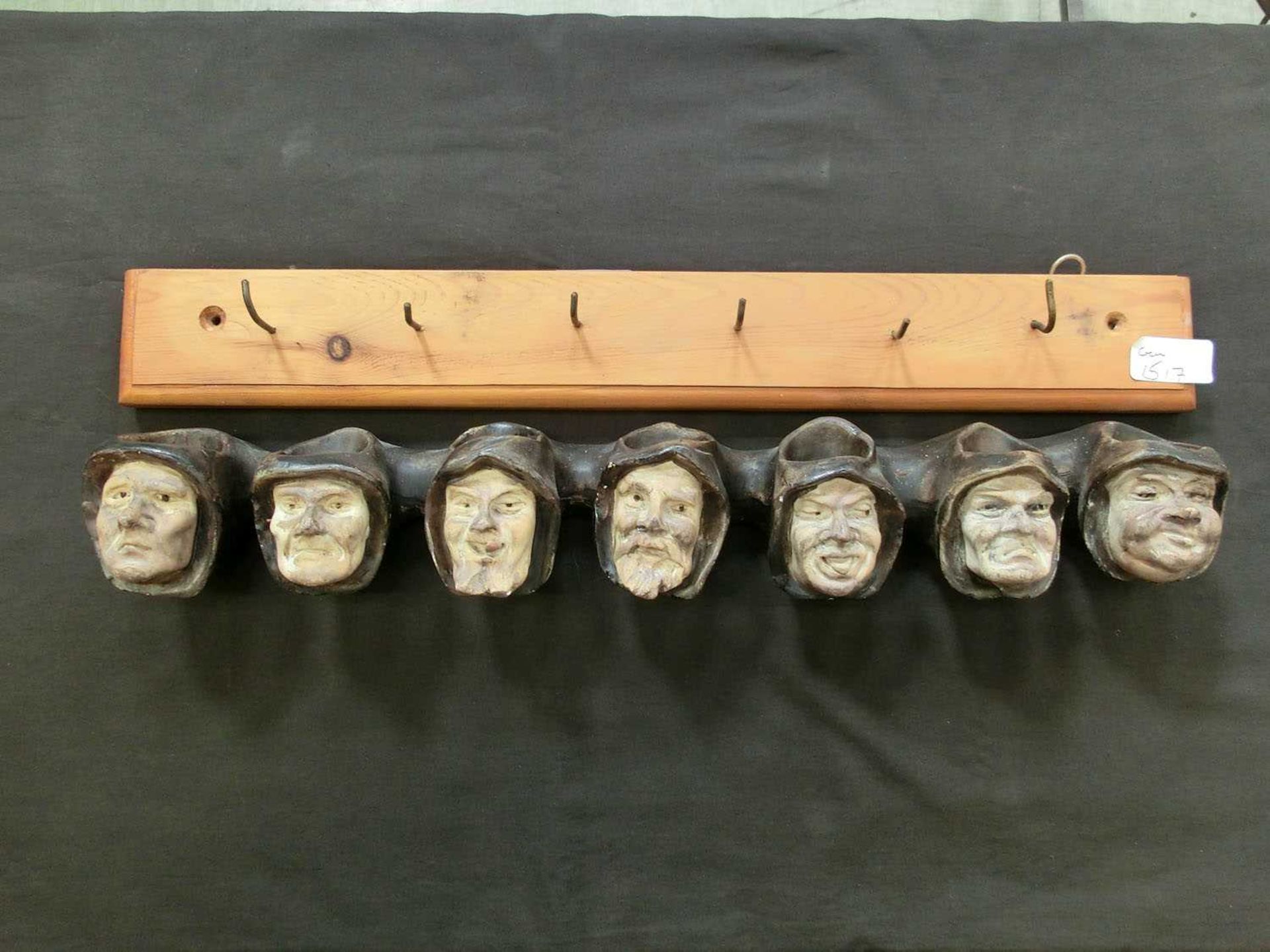 A pipe rack in the form of the seven deadly sins