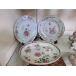 A pair of 19th century floral decorated plates together with similar bowl