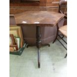 A 19th century and later parquetry topped occasional table on tripod base