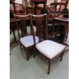 A pair of 19th century mahogany inlaid bedroom chairs