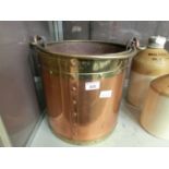 A brass and copper coal bucket