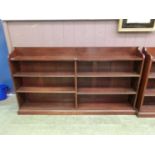An early 20th century mahogany low level bookcase with adjustable shelves